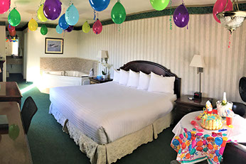 Photo of a room filled with balloons.