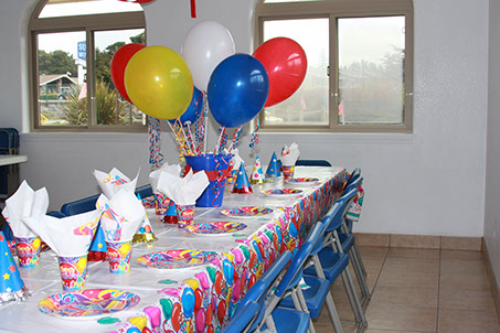 photo showing a table setup for a party.