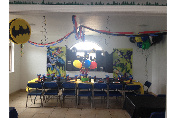 photo of party room set up and decorated with the batman theme.