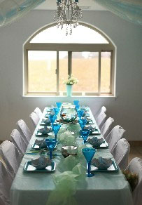 photo showing party room setup with soft pastels of green and blues