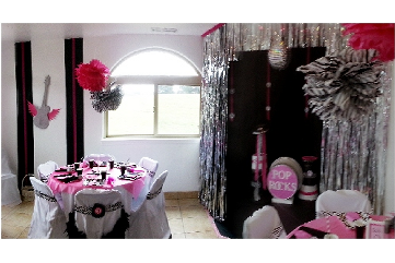 photo of a room decorated for a party. Sign says Pop Rocks! 